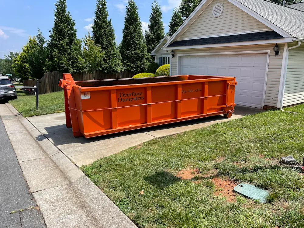 20 yard orange dumpster at home site